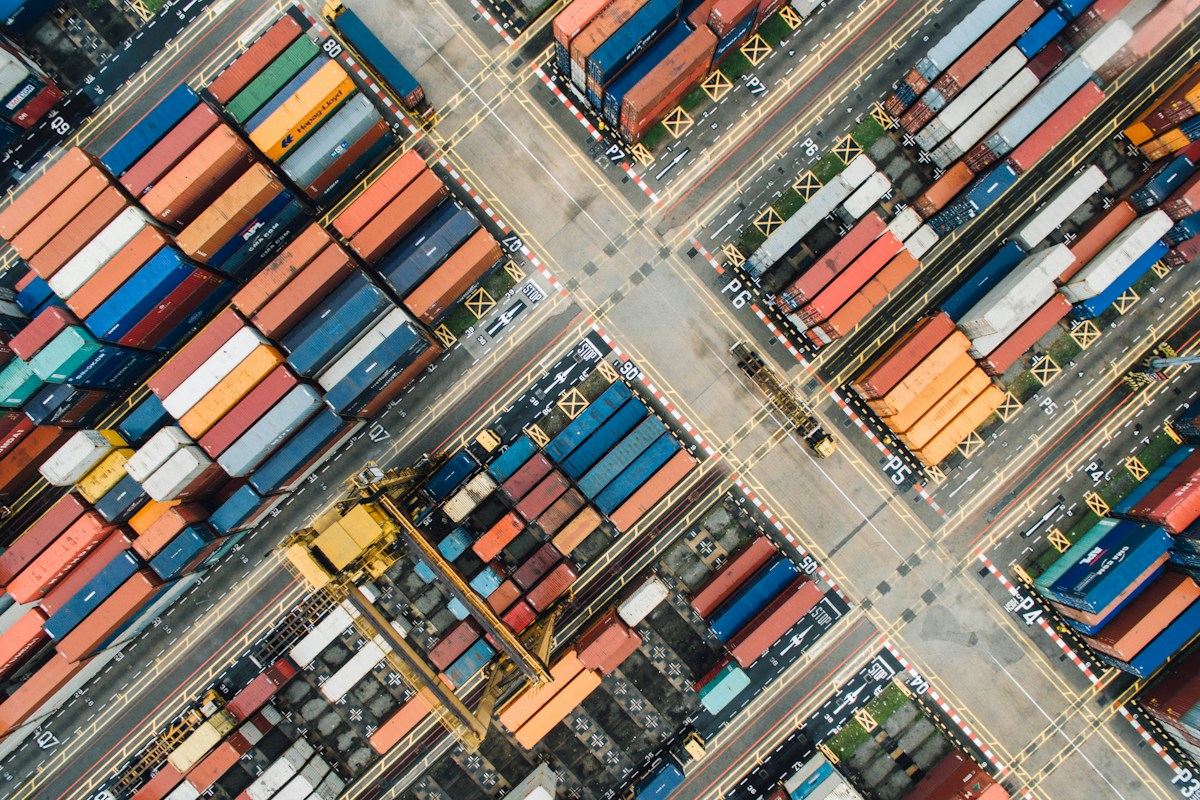 Aerial view of a shipping container terminal and transport lanes